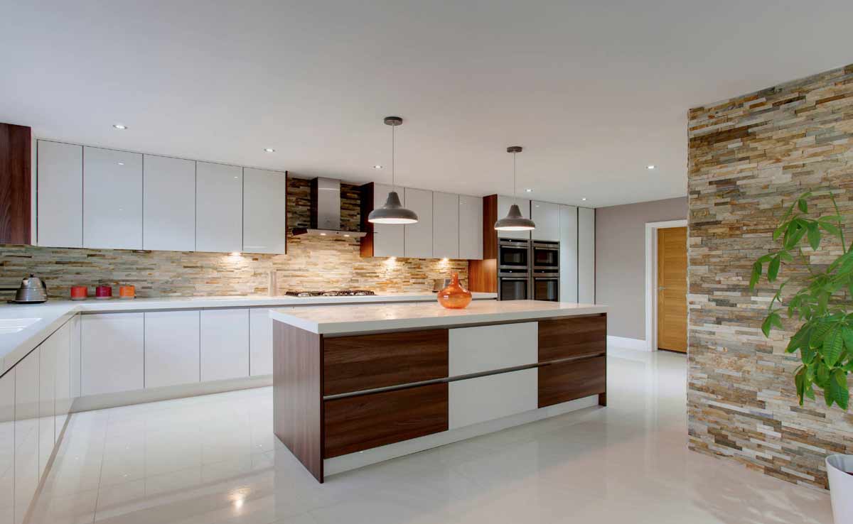 modular kitchen with long wooden island and hafele fittings