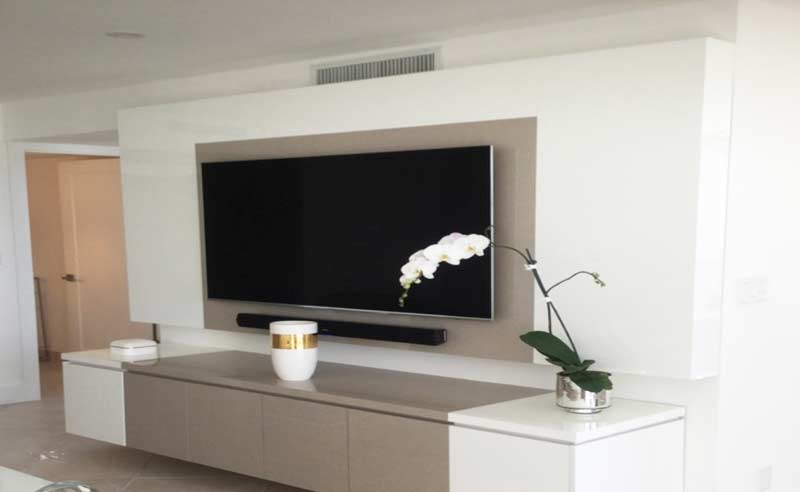 designer tv units with acrylics and base cabinet storage