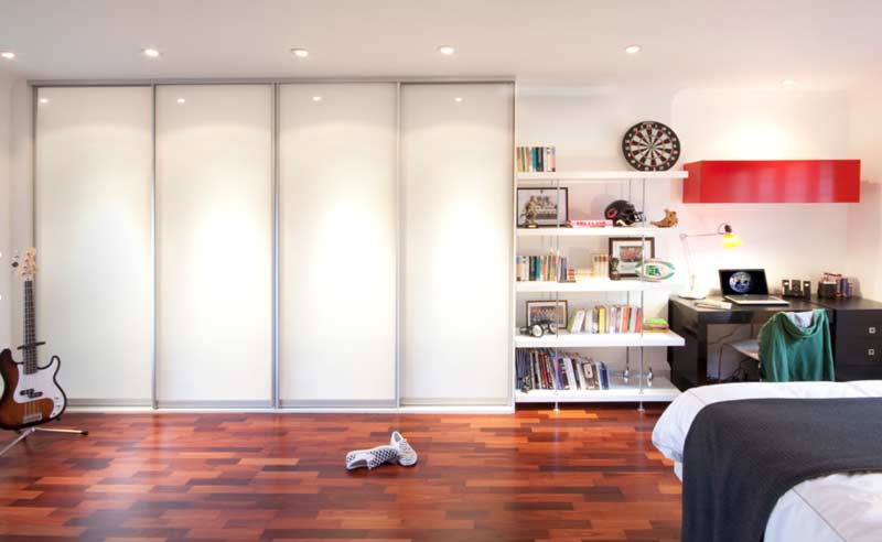sliding wardrobe designs in lacquer glass with storage planning