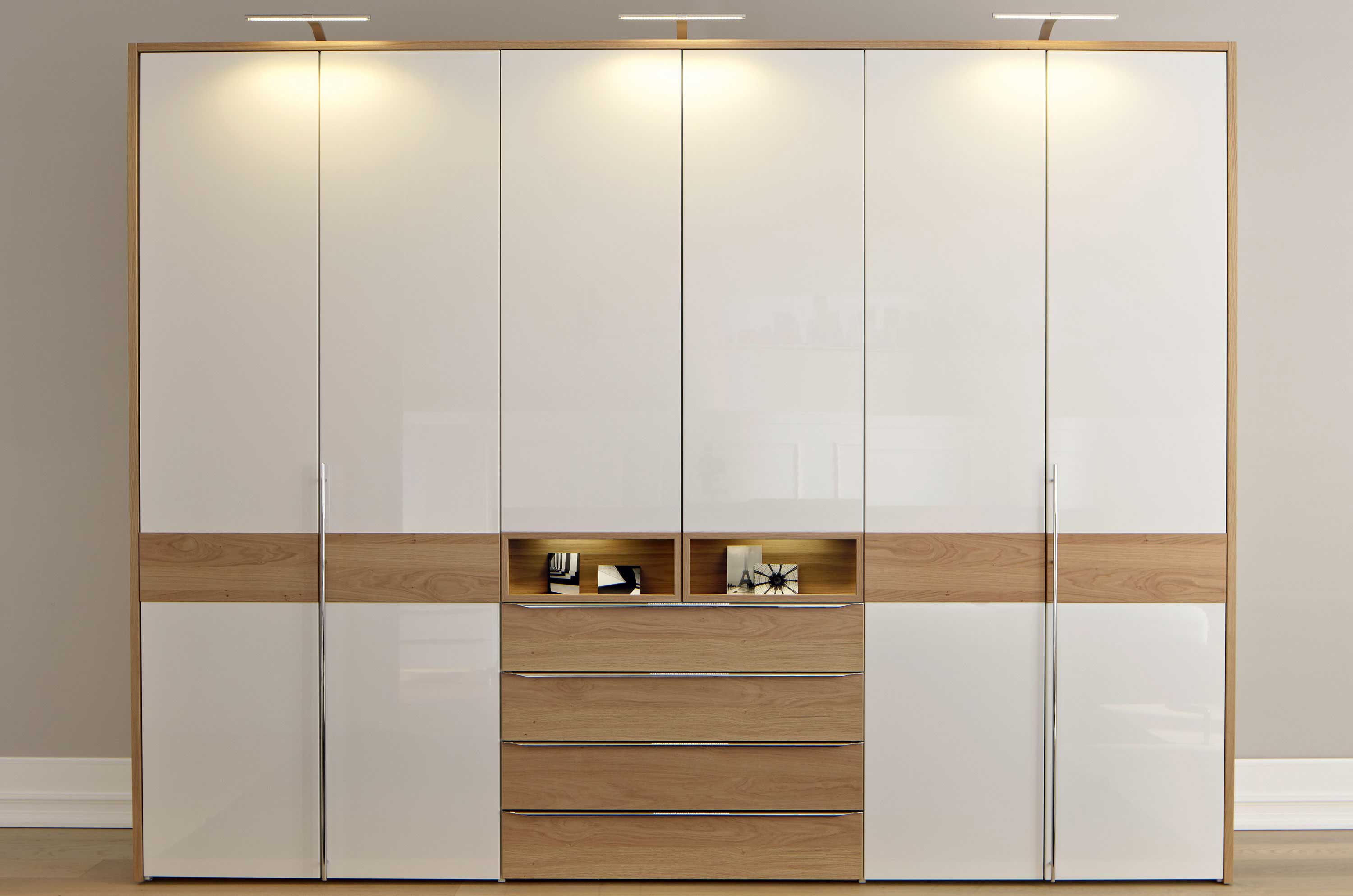 pure white hinged wardrobe with inbuilt lights in noida